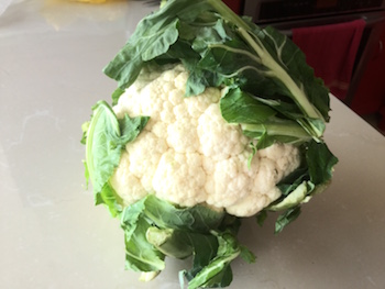 Fresh cauliflower for shrimp pesto pizza